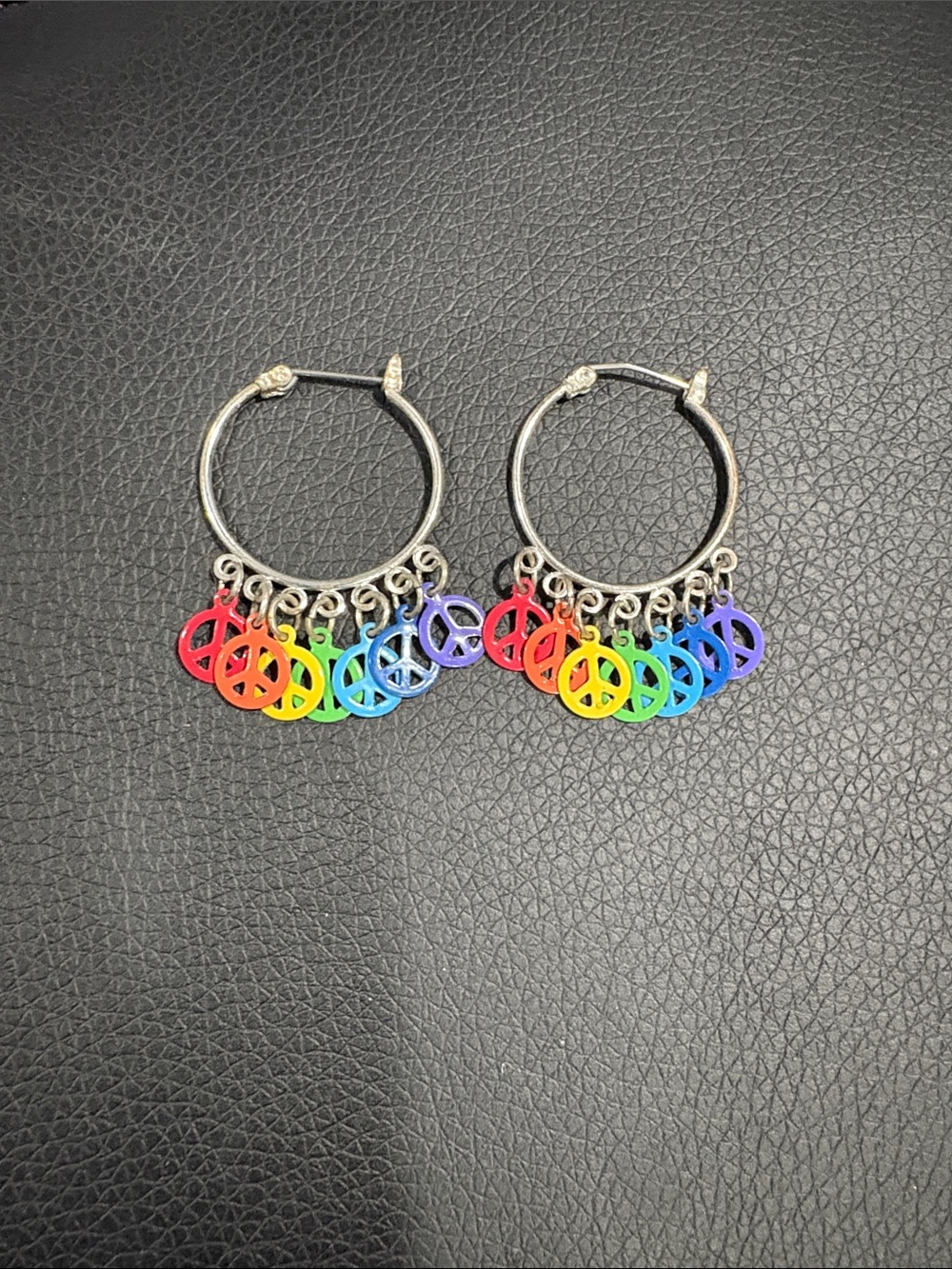 Claire's Silver Hoops with Rainbow Peace Sign Charms